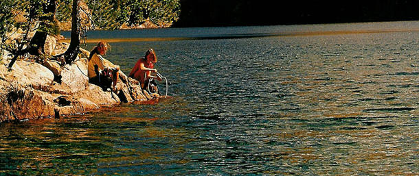 filtering water near camp